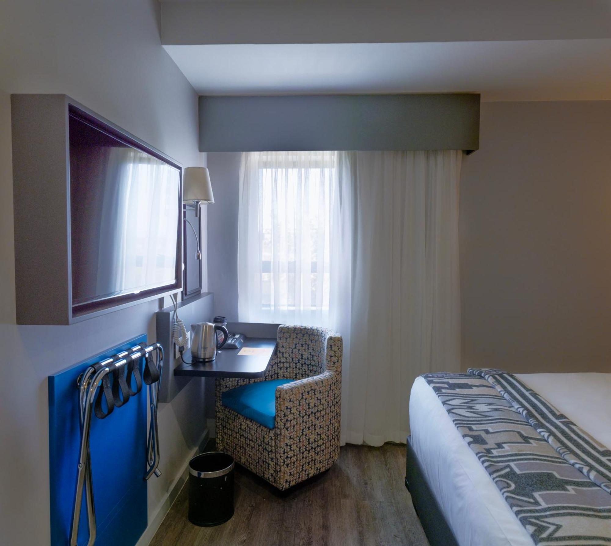 Onomo Hotel Johannesburg Сандтън Екстериор снимка